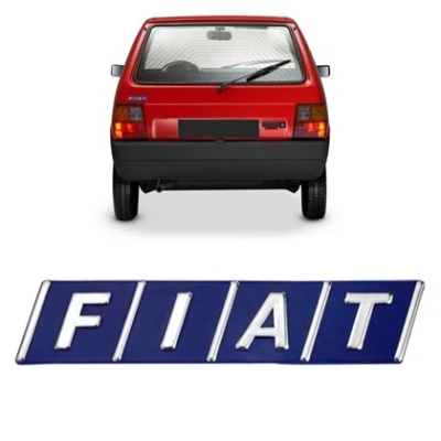 Emblema 'FIAT' - Fiat Uno / Elba / Fiat 147 / Prêmio 1984/1995 - Prata / Fundo Azul / Grade