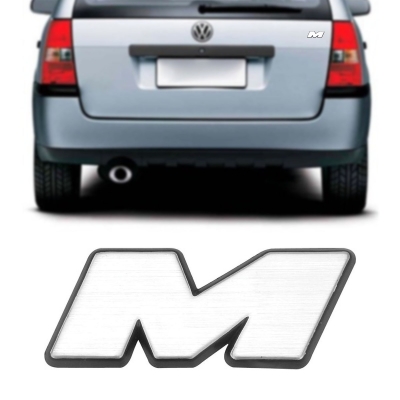 Emblema 'M' - Família Volkswagen 1994/1997 - Cinza Escovado / Fundo Preto / Parte da Logo 'Mi'