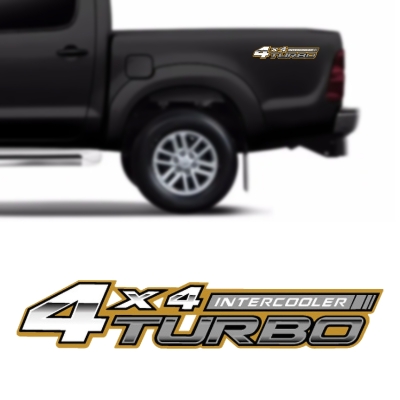 Emblema '4x4 TURBO INTERCOOLER' - Toyota Hilux 2006/2022 - Cinza / Fundo Dourado / Adesiva