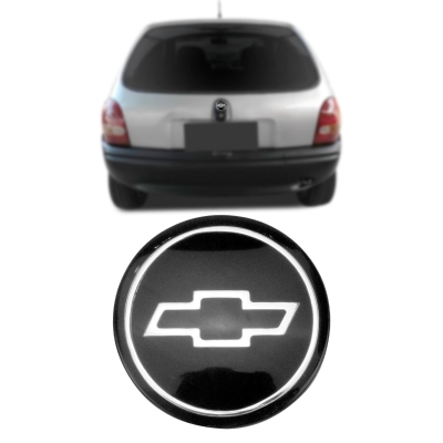 Emblema 'Logo Chevrolet' - Chevrolet Corsa 1994/1996 - Cinza / Fundo Preto / Acrílico / Porta Malas